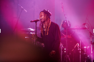 Lil Wayne performing at a Vans event.